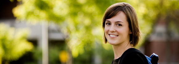 Image of a smiling girl in an outside setting